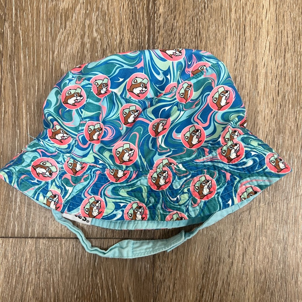 Infant Bucees spf 50+ sun bonnet or hat.  Pink, turquoise and blue with beaver
